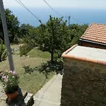 Casa de Férias Tra Er Boscu Er Maa Volastra